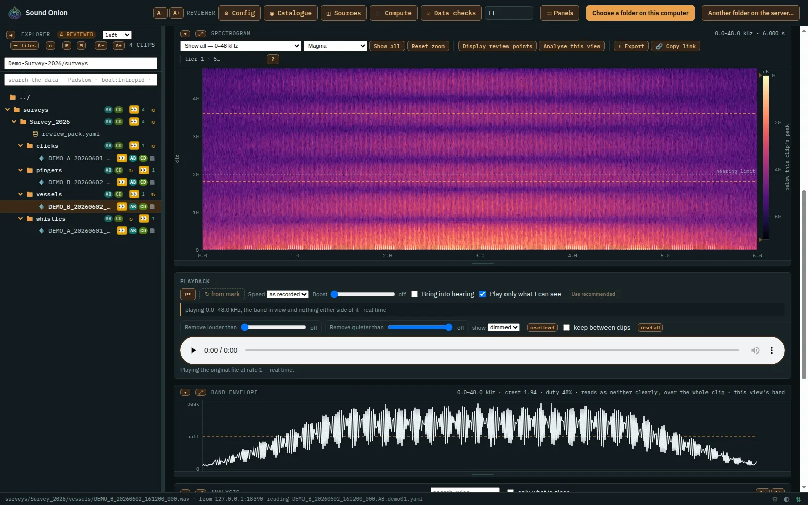 A passing boat: its engine harmonics as bands across the spectrogram, its blade rate in the envelope